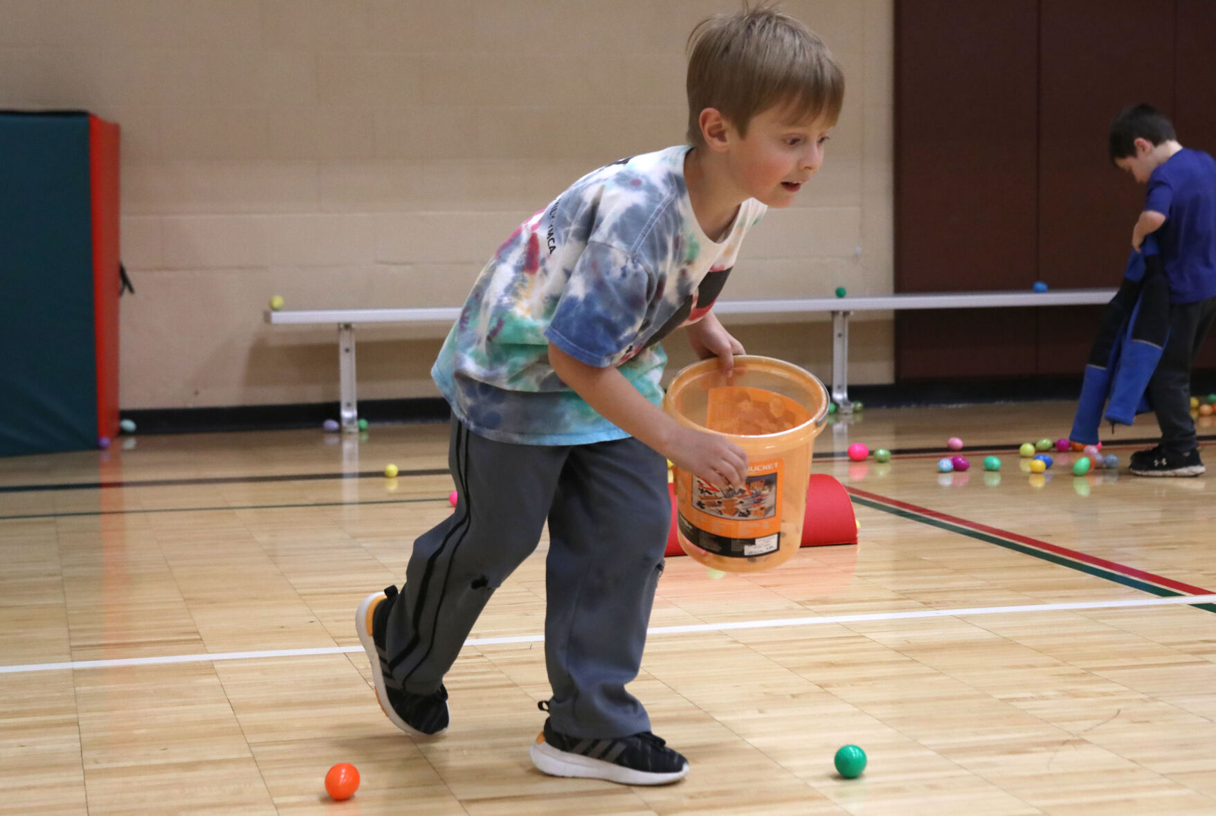 Asher Mueller races for eggs